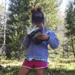 Hunting for huckleberries is a great kid activity