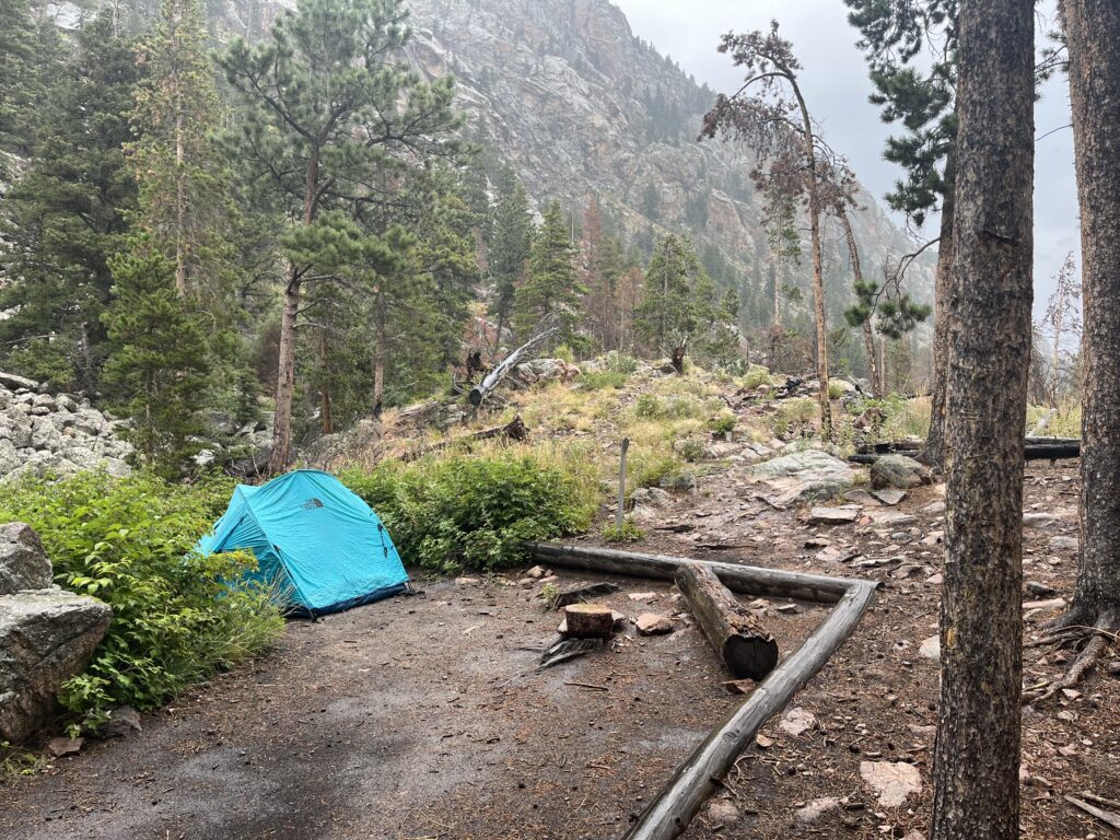 A blue family tent set up in Rocky Mountain National Park
